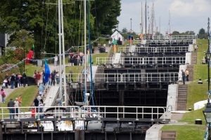 Crowds watching boats lock through neptunes staircase c john g moore